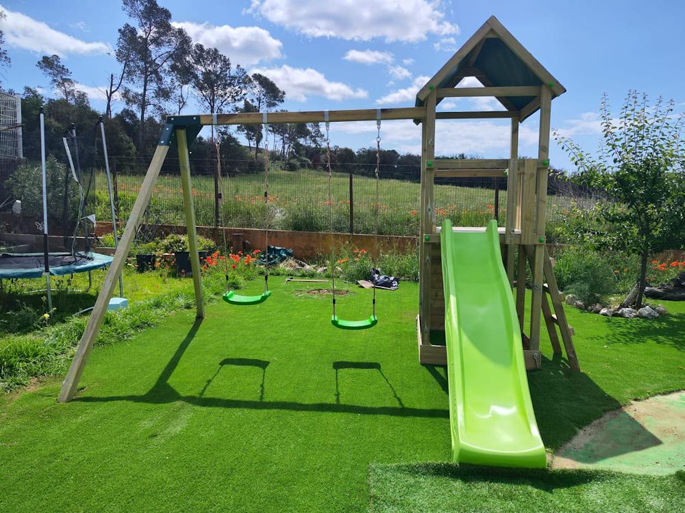 Parque infantil MASGAMES TIBIDABO torre de madera con tobogán, columpio y techo de lona verde